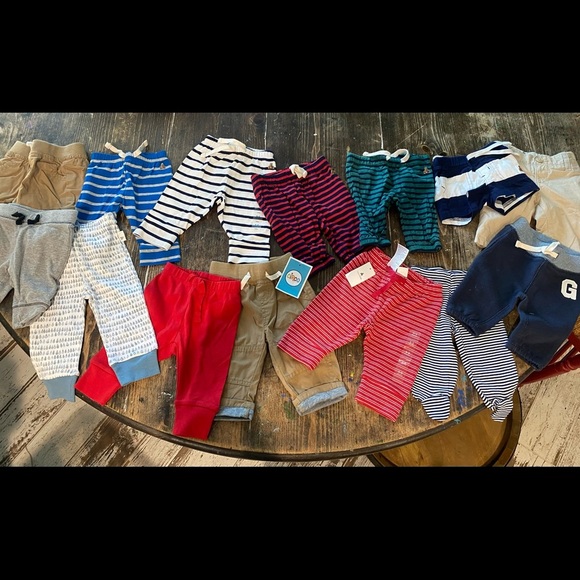 13 pairs of baby BOY pants! Leggings, jeans khaki's & one pair of shorts 💙🤍💙 - Picture 1 of 7